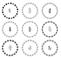 Set of floral wreaths. Hand drawn flourishing frames. Compositions with decorative flowers, herbs, leaves and branches. Vintage botanical illustrations.