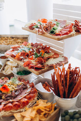 Buffet table at the wedding, sweet and meat