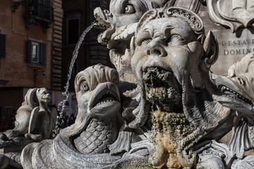 Rome, sculptures of the fountain in the square near the temple of all the Gods - the Pantheon