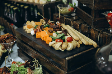 Buffet table at the wedding, sweet and meat
