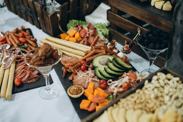 Buffet table at the wedding, sweet and meat