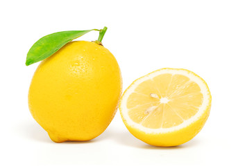 Lemon cut half with leaf isolated on white background with clipping path