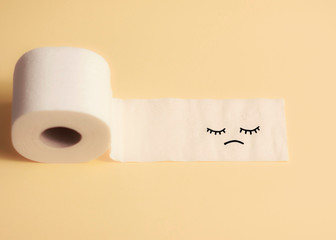 The background of toilet paper unhappy and waiting to be plucked.