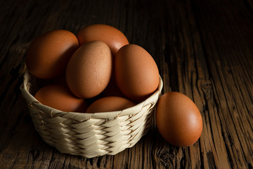 Organic white eggs in basket