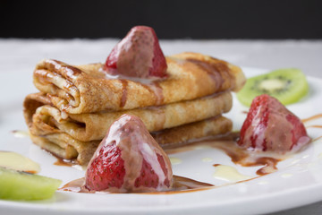 pancakes in table with dried fruits. Horizontal