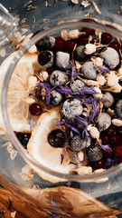 tea in a glass teapot with herbs
