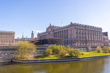 Fototapeta na wymiar The Swedish parliament house. Riverside view. Stockholm the biggest scandinavian city.