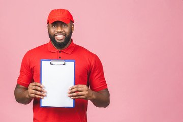Delivery concept. African american delivery man presenting receiving form isolated over pink background.