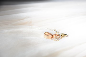 wedding rings on a flower