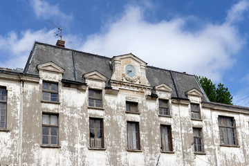 Fototapeta na wymiar Facade of old public school in Paris suburb. Ivry sur Seine city