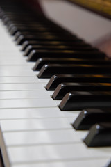 Close-up or macro image of piano keys by selective focus technique can be seen the details of...