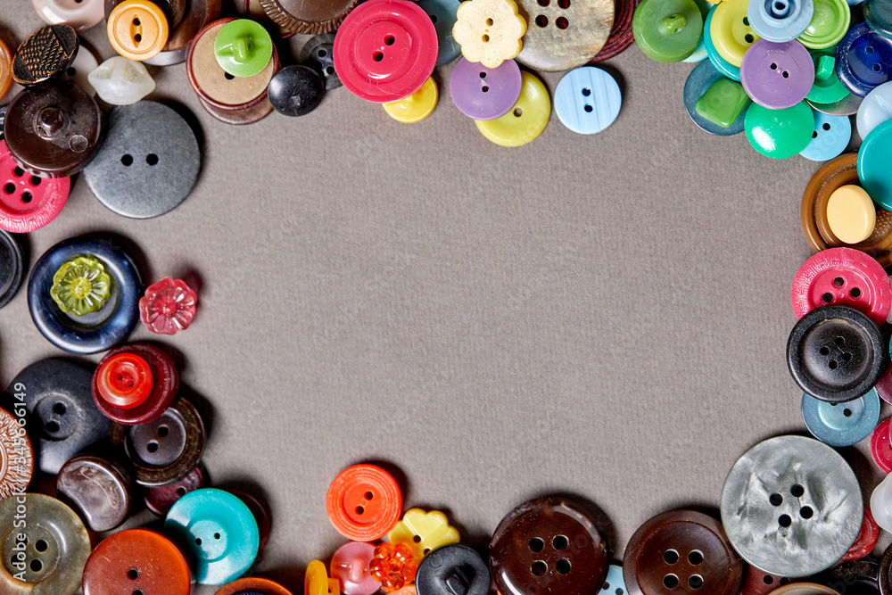 Poster Background and texture of multicolored antique buttons