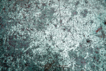 Stained texture of old material with cracks. Turquoise, green, gray, blue color