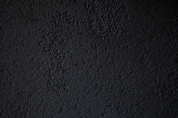 Texture of new plaster, cladding, wall covering, decorative plaster, deep black color