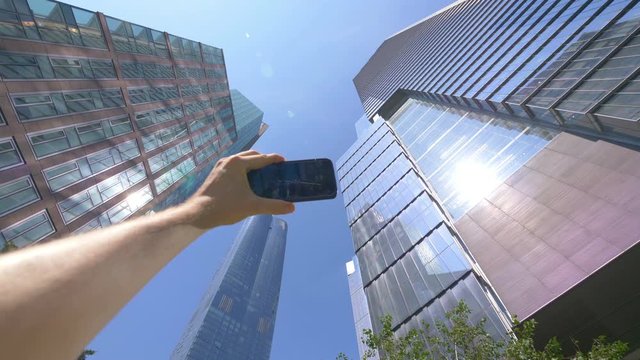 POV on Tourist Photographing Financial Manhattan District in NYC in 4K Slow motion 60fps
