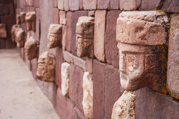 Relief head sculptures at the pre-Columbian archaeological site in Tiwanaku, Bolivia