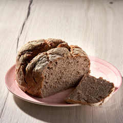 Traditional bread on wooden table