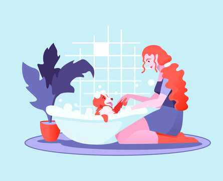 Red haired girl sitting on the floor washing a happy dog in foam bath. Pet care concept. Vector flat illustration. Cartoon colorful style. All elements are isolated.