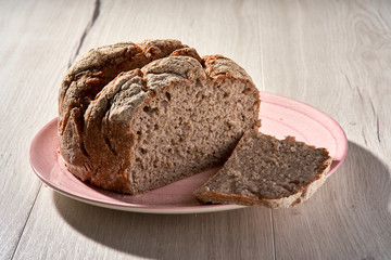 Traditional bread on wooden table