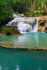 The beautiful Erawan cascade waterfall with turquoise water like heaven at the tropical forest ,Kanchanaburi Nation Park, Thailand