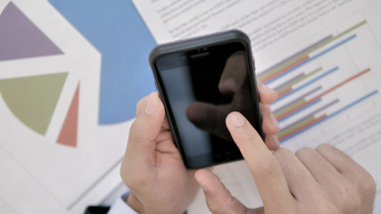 Top View of Using Smartphone at Work