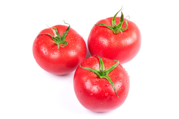 Red fresh tomatoes isolated on white background in close-up
