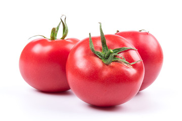 Red fresh tomatoes isolated on white background in close-up