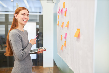 Business woman in brainstorming workshop