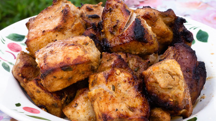 cooking pork skewers on the grill. meat with spices.