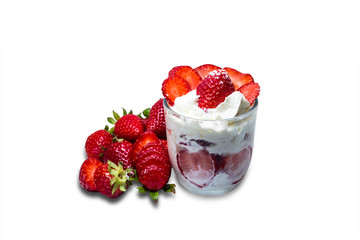 Closeup of fresh strawberries and dessert isolated on white background.
