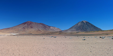 Panorama of the volcanoes Licancabur and Juriques. South Lipez. Bolivia