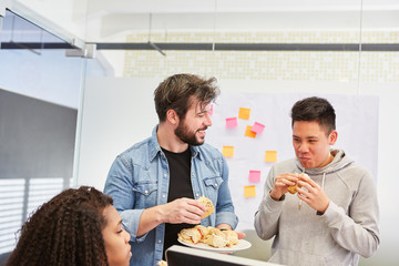 Team employees take a break at a snack