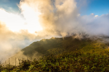 Beautiful of multiple mountains valley at sunrise in the morning at Phu chi Duen, Chiang Rai Province, Thailand