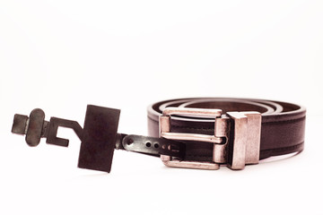 Close-up new classic men's brown leather belt on a white background. 