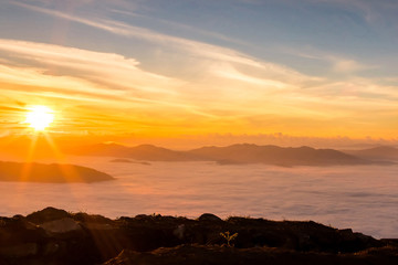 Beautiful of multiple mountains valley at sunrise in the morning at Phu chi Duen, Chiang Rai Province, Thailand