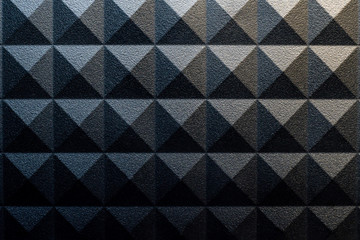 Panele Szklane  Grunge pyramid pattern background with light