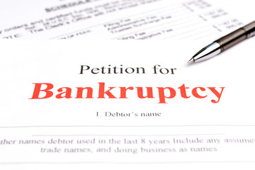 Bankruptcy concept. Close-up bankruptcy petition and pen.