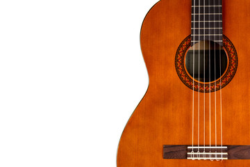 Obraz premium Acoustic guitar neck with body and strings on white background in close-up