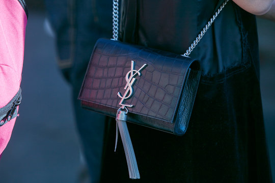 Woman With Black Crocodile Leather Yves Saint Laurent Bag  On June 18, 2017 In Milan, Italy