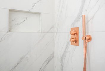 Close Up Of Upscale Shower Cabin With Copper Faucet.