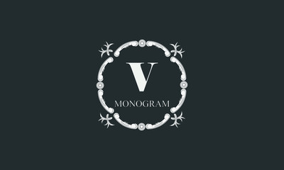 Fototapeta premium Exquisite floral monogram with letter V. Magnificent three-dimensional logo. Elegant frame for business sign, label, boutique brand, hotel, restaurant, heraldry.