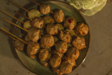 thai meatball with thai sweet chili sauce on plate top view flatlay