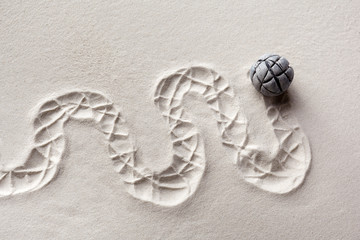Sensory sand game. Modern zen garden concept. Top view