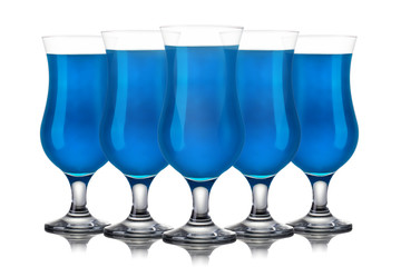 Set of blue curacao cocktails in hurricane glass isolated on white background