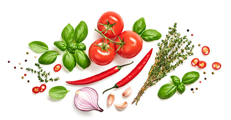 Tomato, basil, spices, chili pepper, onion, thyme. Vegan diet food, creative composition isolated...