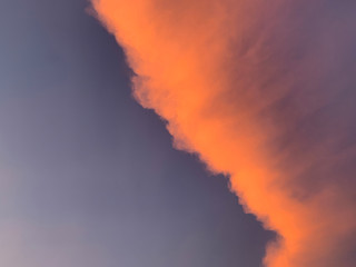 View of clouds and sky with dreamy, magical colors on sunset.