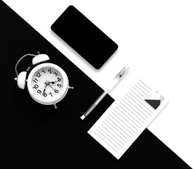 time for business, alarm clock, mobile phone and pen isolated on white