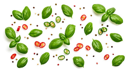 Basil, spices, pepper, garlic pattern. Vegan diet food, creative green basil background isolated on white. Fresh basil leaf layout, cooking concept, fashion wallpaper
