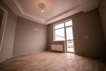 Room in the house apartment right after the renovation. New and without furniture