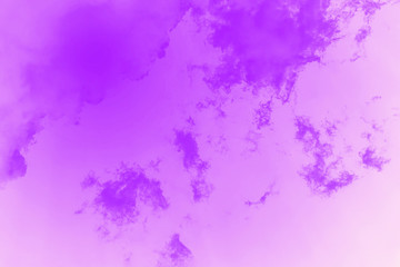 Fototapeta na wymiar Beautiful violet sky background with clouds. Toned photo